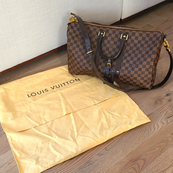 Authentic Louis Vuitton travel bag - Picture 1 of 8